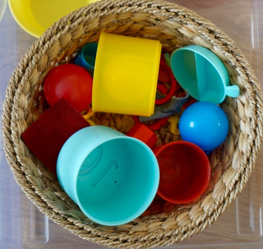 Colour sorting box for toddlers. It uses toys and things to have around the house to develop understanding and language in a fun way.