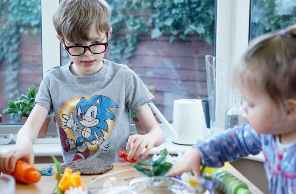 Spring play dough. This is a great invitation to play for toddlers, preschoolers and beyond. It's a good steam homeschool activity giving opportunities to talk about the changes of the season. 